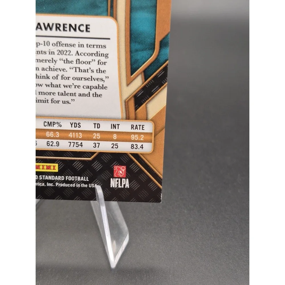 2023‎ Panini Gold Standard Trevor Lawrence #53 White Gold /49 Jaguars
